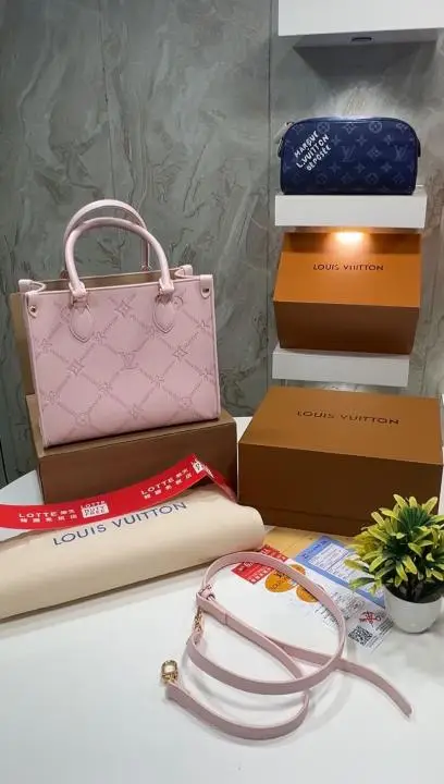 Pink monogram tote bag with accessories